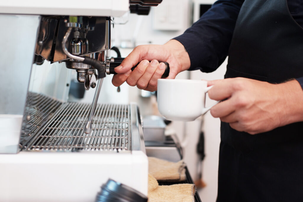 Close up of hand of male barista