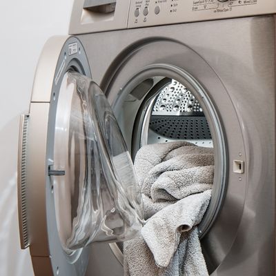 Vivos Academy student practicing laundry skills